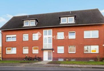Solides Mehrfamilienhaus mit sechs Wohneinheiten, Garten und stabiler Vermietung