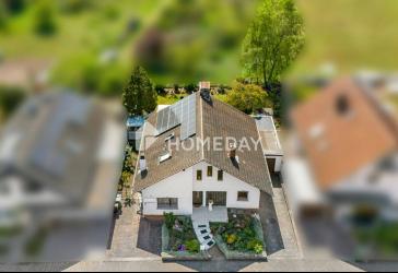 Modernisiertes Familienhaus mit Gartenidylle und neuer PV Anlage