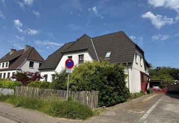 Schleswig: Charmante Doppelhaushälfte in Bestlage von Schleswig - mit Wintergarten & Traumgarten