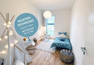 Großzügiger Wohnbereich, Sonnenbalkon & zwei Bäder - stilvolle 3-Zimmer-Neubau-Wohnung im Grünen