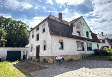 Doppelhaushälfte mit 2 Wohneinheiten und Garagen in Osnabrück-Eversburg