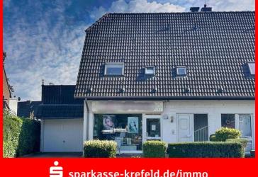 Doppelhaushälfte mit Ladenlokal