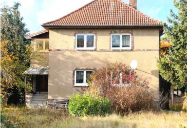 Ohne zusätzl. Käuferprovision: Charmantes EFH mit Vollkeller, großer Garage und Nebengelass auf großzügigem, sonnig. Grundstück in d. Falkenh. Alpen