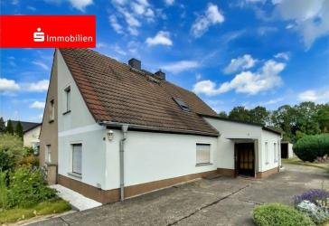 Einfamilienhaus mit großen Grundstück in perfekter Lage