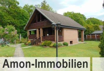 Ein liebenswertes Einfamilienhaus mit überdachten Terrassen, Balkon, Garage u.v.m. für Naturliebhaber.
