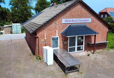 Modernisiertes Ladenlokal mit großem Außenlager und Neubaupotenzial