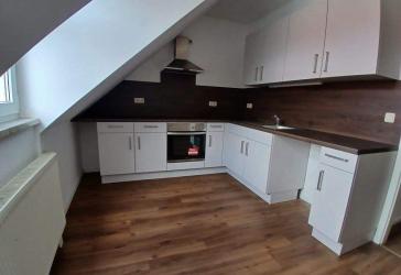 Dachgeschoßwohnung mit Balkon und Stellplatz
