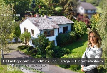TOP GELEGENHEIT! Attraktive Preissenkung - Freistehendes Einfamilienhaus mit Aussicht, Garage und großem Grundstück
