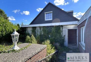 Großzügiges Einfamilienhaus mit schönem Garten, Doppelgarage und Vollkeller in familiärer Gegend