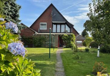 Familientraum mit Einliegerwohnung & großem Garten - Ihr neues Zuhause in Oldendorf