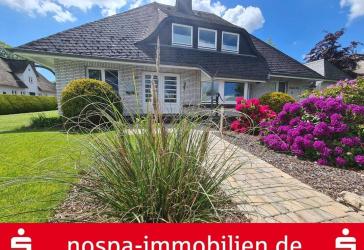 Gepflegtes Einfamilienhaus mit genehmigter Ferienwohnung, 5 Bädern, 2 Terrassen und Saunabereich