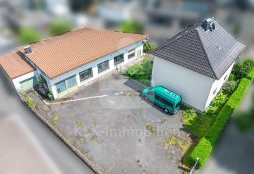 Zentrale Lage - starke Kombination aus Wohnhaus und Gewerbefläche mit Entwicklungschance.