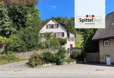 Sanierungsbedürftiges Einfamilienhaus in Hanglage zu verkaufen!