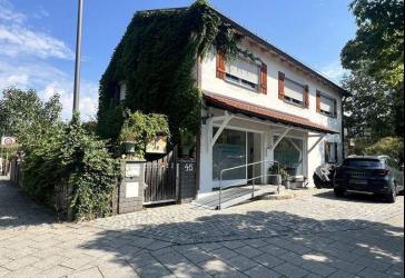 RE/MAX - Haus kaufen und Wohnen + Rendite unter einem Dach - Vielseitiges Wohn- und Geschäftshaus!