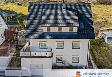 Ein Zuhause zum Wohlfühlen: Einfamilienhaus mit Garten und Garage