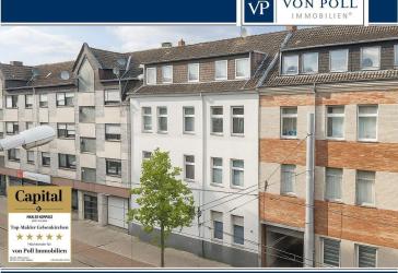 Gepflegtes Mehrfamilienhaus mit sechs Wohneinheiten und fünf Garagen in zentraler Lage