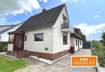 Sehr gepflegtes Einfamilienhaus mit angrenzender Wohnung auf schönem Grundstück in Quickborn-Renzel