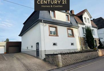 Familienfreundliches Einfamilienhaus mit großzügigem Garten und viel Raum für Lebensqualität