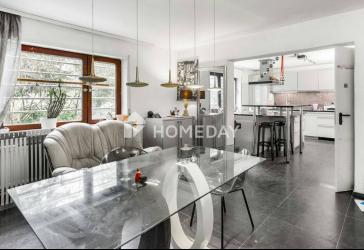 Traumhaftes Mehrfamilienhaus mit großzügigem Garten, luxuriösem Badezimmer und Wintergarten