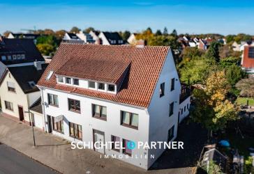 Vegesack | Mehrfamilienhaus mit Gewerbe, Garagen und großem Grundstück