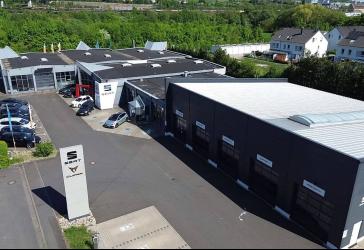 Premium Autohaus für 180+ KFZ mit Neubau Werkstatt in Top-Lage an der Stadtgrenze zu Würzburg!