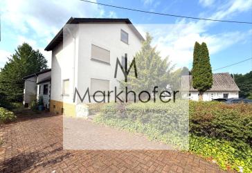 Einfamilienhaus mit zusätzlichem Baugrund in Bexbach - großes Potenzial für Eigennutzer & Investoren