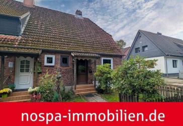 Kleines Reihenendhaus mit eigenem Grundstück und Stellplatz in zentraler Lage von Schleswig