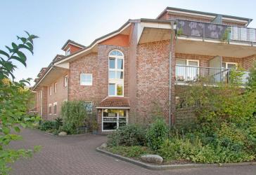 Ruhige Wohnlage in Norderstedt - Attraktive 3 Zimmer Dachgeschosswohnung mit Balkon und Tiefgaragenstellplatz