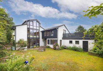 Ein Hauch von Luxus für große und kleine Entdecker: Exklusives Familienrefugium auf drei Ebenen mit Dachterrasse