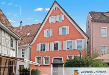 Sanierungsbedürftiges Mehrfamilienhaus