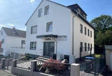 Die ganze Familie unter einem Dach! Äußerst gepflegtes Dreifamilienhaus auf sonnigem Grundstück!