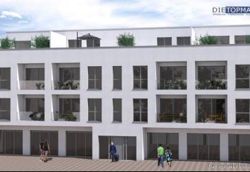 Wohn- und Geschäftshaus mit stabilen Mieteinnahmen und genehmigtem Neubauprojekt