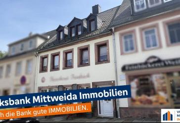 Wohnhaus mit Ladengeschäft im Erdgeschoss in zentraler Lage