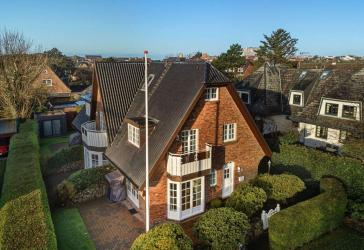 Ankommen und wohlfühlen: Ruhiges Endhausteil mit Südterrasse, Sauna & Strandnähe