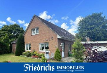Ein-/Zweifamilienhaus mit großzü. Garten, Garage sowie abtrennbarem Bauplatz in Edewecht-Osterscheps