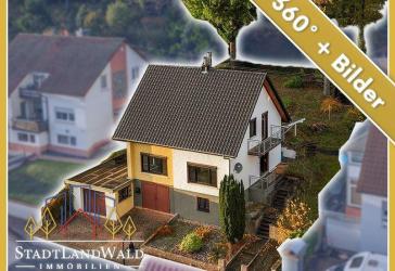 Erhöht wohnen, entspannt leben - Einfamilienhaus mit Fernsicht, Garten und Garagen