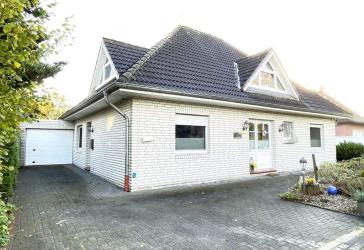 Großzügiger Bungalow mit Garage, Terr. u. kl. Garten.
