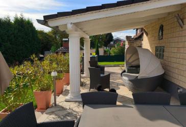 Hochwertiges Einfamilienhaus mit Wintergarten, Doppelgarage und Traumgarten