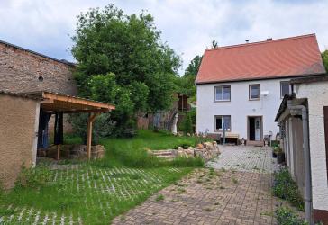 Einfamiliehaus mit Garten in Hanglage