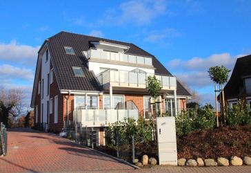 Genehmigung zur Ferienvermietung! Helle 2-Zi Wohnung mit sonniger Süd-West Terrasse auf Eigenland