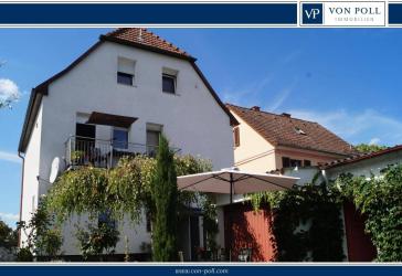 Lichtdurchflutetes Familiendomizil mit stilvollem Garten und Wohlfühlambiente