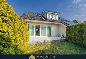 Modernisiertes Zweifamilienhaus mit Gewerbeeinheit - Umbau zum großzügigen Einfamilienhaus möglich