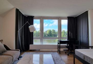 Familienglück auf 148 m² - Großzügige Maisonette mit Kanalblick in Westerrönfeld