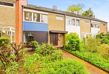 Renovierungsbedürftiges Reihenhaus mit schönem Garten, Vollkeller und Einzelgarage in Barsbüttel