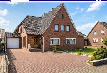 Einfamilienhaus mit separater ELW, Kamin, Sauna und traumhaftem Garten in Westrhauderfehn