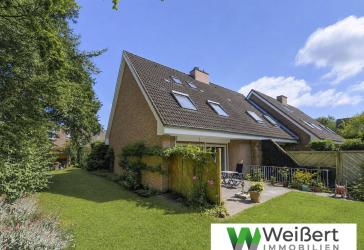 Familienglück mit Südgarten, Kachelofen und Garage - gepflegtes Endreihenhaus in ruhiger Lage