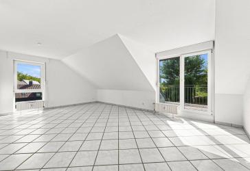 Dachgeschosswohnung über zwei Etagen mit Balkon, Garten und Garage in Bochum-Günnigfeld
