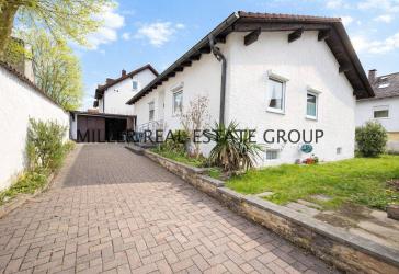 Seltene Gelegenheit in Ingolstadt-Unterhaunstadt: Großzügiger Bungalow mit Vollkeller, Doppelgarage, Garten & Ausbaupotenzial!