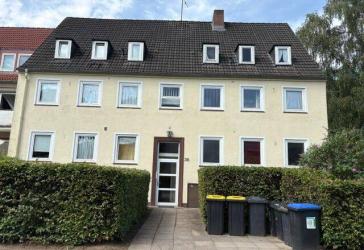 KAPITALANLAGE IN AHRENSBURG VERMIETETE 2 1/2-ZIMMER -ERDGESCHOSSWOHNUNG MIT GARTENANTEIL