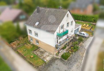 Sanierungsbedürftiges, voll vermietetes Dreifamilienhaus für Anleger & Handwerker in Windeck-Mauel.